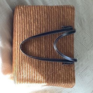 Straw handbag with brown leather straps